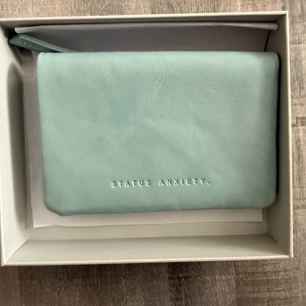 Status Anxiety Is Now Better Wallet